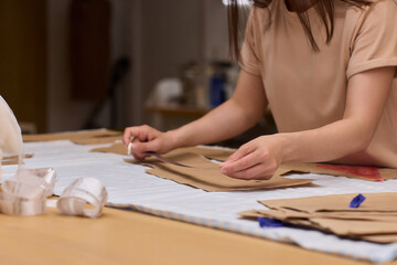 Tailoring Craftsmanship A Fashion Designer at Work Creating Beautiful Patterns with Precision