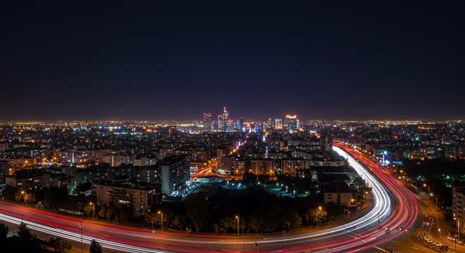 Night Cityscape: Bucharest's Illuminated Streets and Skyline