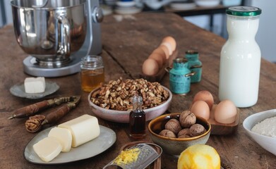 In a warm rustic kitchen, a premium stand mixer prepares ingredients for cozonac, a traditional Eastern European sweet bread enjoyed during festive celebrations using wholesome ingredients
