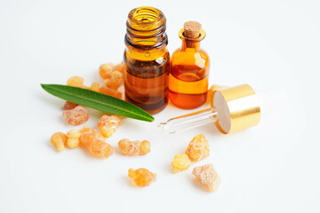 Frankincense or olibanum aromatic resin isolated on white background used in incense and perfumes.