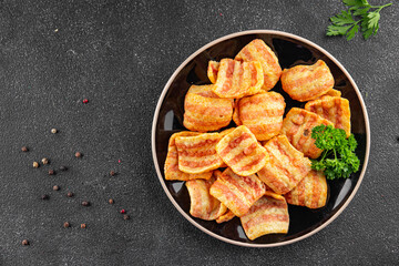 Chips bacon crispy rashers corn snacks fast food natural food fresh dish on the table rustic food top view copy space