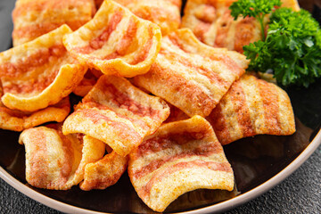 Chips bacon crispy rashers corn snacks fast food natural food fresh dish on the table rustic food top view copy space