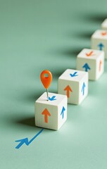 A series of white blocks with upward arrows, highlighted by a block with an orange pin. A blue arrow points diagonally toward the highlighted block