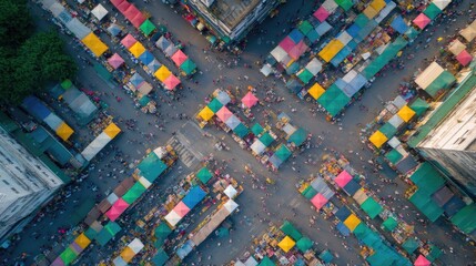 bustling aerial view of vibrant urban market featuring colorful stalls and busy shoppers