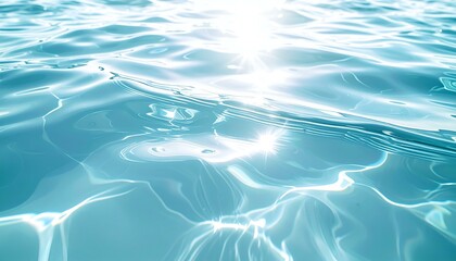 Fototapeta premium Sparkling turquoise water surface, sunlight reflecting, abstract aquatic background. Perfect for summer, travel, or relaxation themes.