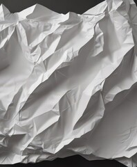 Fototapeta premium Severely crumpled white paper, showing deep shadows and intense wrinkles , design element, crumpled texture