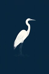 Naklejka premium Elegant heron stands against deep blue background, showcasing de