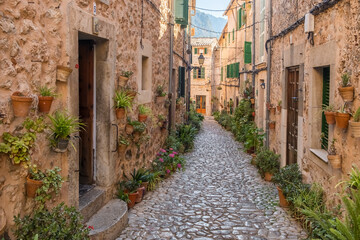 Fototapeta premium Picturesque narrow street in the Valdemossa town, Mallorca, Spain