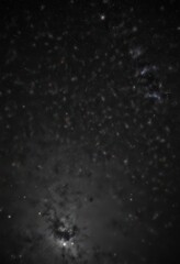 Obraz premium Sparkling stars scattered across a deep, inky black night sky , sparkle, cosmic dust