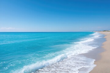 Fototapeta premium tranquil scene of deserted beach with gentle waves lapping at shore under clear sky