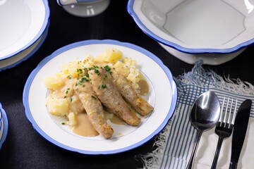 rabbit with cream sauce and mashed potatoes