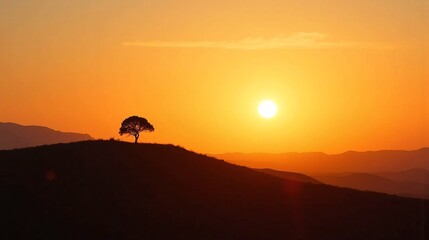Fototapeta premium Solitude in Twilight: A Lone Tree's Serenade
