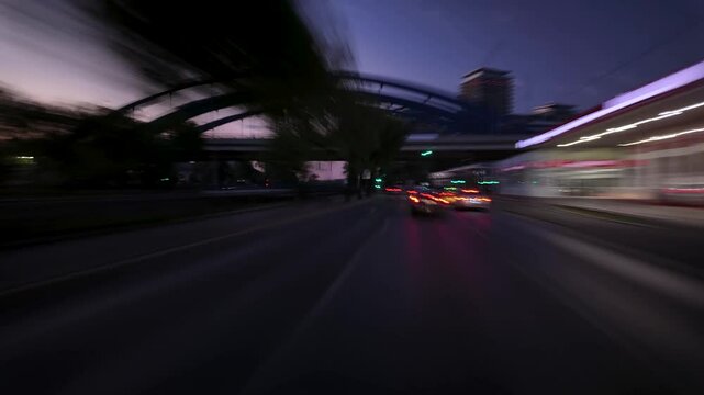 Urban hyperlapse driving through Bucharest Romania at sunrise with city traffic