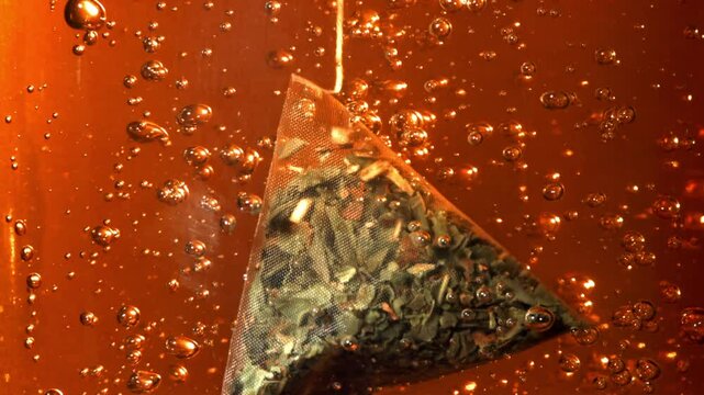Black tea bag with air bubbles. Filmed on a high-speed camera at 1000 fps. High quality FullHD footage