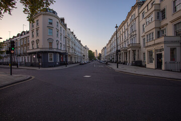 A peaceful and quiet urban street at sunrise located in a historic neighborhood setting - Saint Georges Drive - London