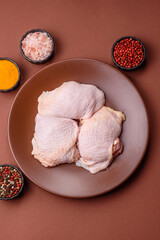 Chicken thigh raw, fresh poultry meat with salt and spices