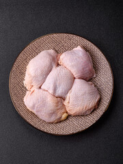 Chicken thigh raw, fresh poultry meat with salt and spices