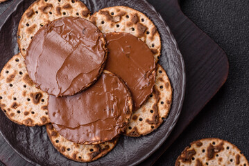 Matzah with chocolate paste for the Jewish holiday of passover