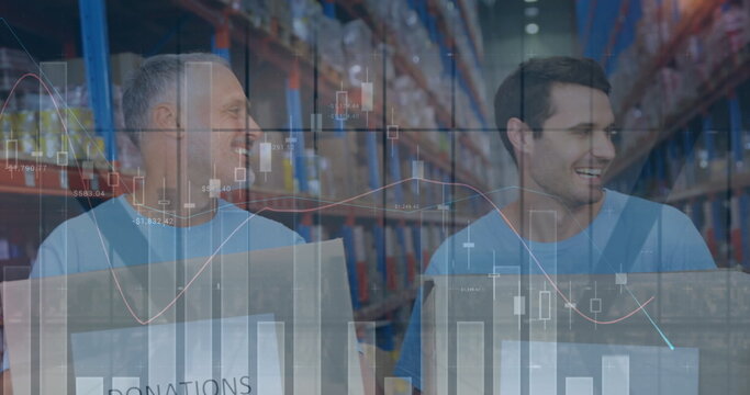 Image of financial graphs over happy diverse female and male warehouse workers