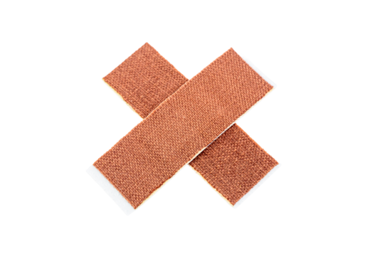Medical adhesive bandage isolated on white background. Crossed bandage.