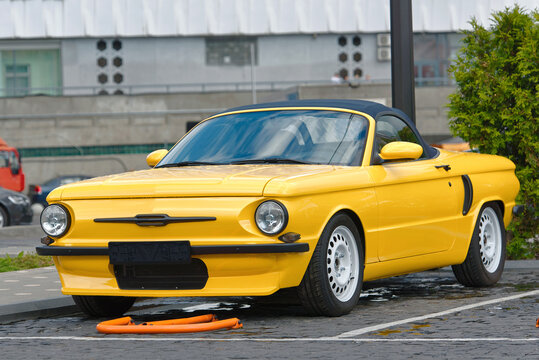 Minsk, Belarus. May 27, 2021. ZaPprsche  - unique yellow car built on the Porsche Boxter S (986) based on the design of the iconic Soviet car ZAZ-968 "Zaporozhets". Made by ShifCustom workshop
