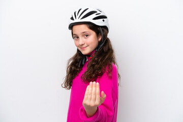 Little cyclist girl isolated on white background inviting to come with hand. Happy that you came
