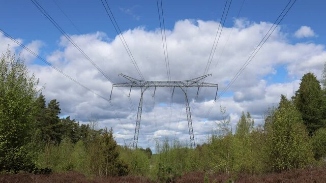 Power lines for electricity distribution. High voltage. Stockholm, Sweden. May 2025.