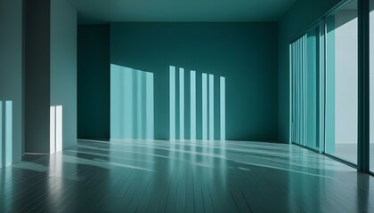 The teal-colored empty interior displays a wooden floor and light creating interesting shadows.