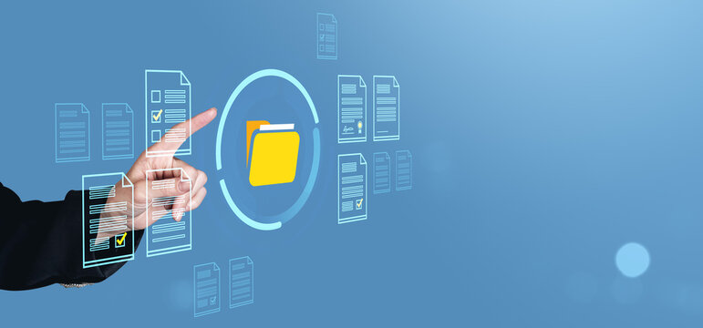 Hand interacting with digital folder icon and documents on blue background.