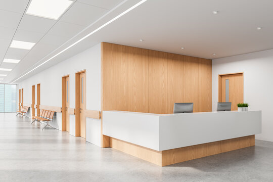 Modern hospital or clinic reception area with minimalist interior design and wood panel accents on white walls and ceiling lights. 3D Rendering. 3D Rendering