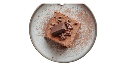 Top view of a square chocolate cake with a chocolate piece on a speckled plate isolated