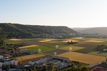 Land plot in aerial view. Include landscape, real estate, green field, crop, agricultural plant.Tract of land for housing subdivision. Aerial view of land and positioning point area.