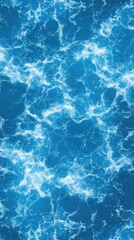 Obraz premium Water Surface Aerial view of ocean water with white foam, deep blues, and vibrant patterns