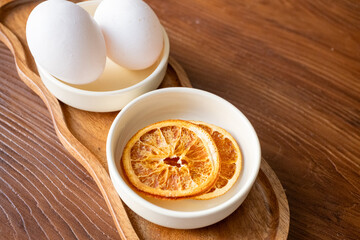 Breakfast eggs and dried oranges on a serving plate japanese culture