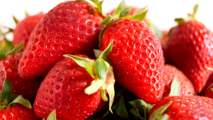 Strawberries, fresh ripe strawberries on white background- isolated close-up