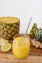 Homemade Pineapple Ginger Lemon Smoothie in a Glass, Refreshing Detox and Anti-Inflammatory Drink
