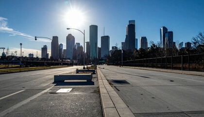 Fototapeta premium Stunning View of Houston Skyline with Clear Blue Sky and Sunlight