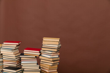 Stacks of old books to study in the library as a background