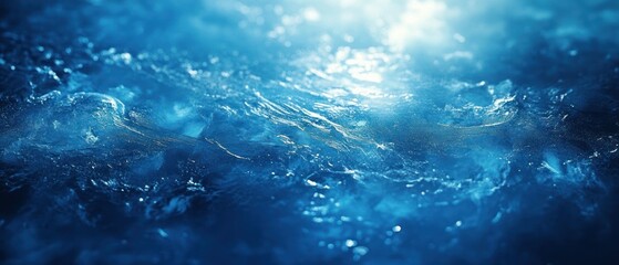 Water waves ripple, reflecting light and creating a dynamic, turbulent surface.