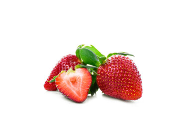 Fresh ripe strawberries on a white background. Whole and sliced berries. Healthy summer fruit. Close-up.