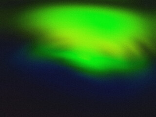 A glowing sea of radiant colors flowing gently into a peaceful horizon creating a dream world of vibrant beauty and serene energy