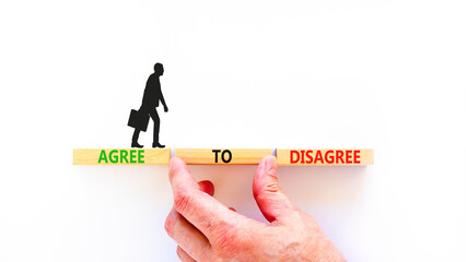 Agree to disagree symbol. Concept words Agree to disagree on beautiful wooden block. Businessman's...