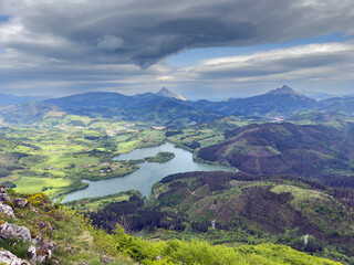 Breathtaking panoramic view over urkulu reservoir and surrounding mountains in basque country.
