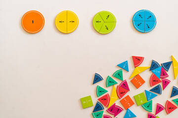 Colorful educational math manipulatives arranged on a light surface promoting learning and engagement in a classroom setting during the morning