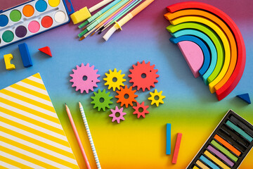 Creative tools and colorful supplies set on a vibrant workspace ready for artistic activities and children's crafts
