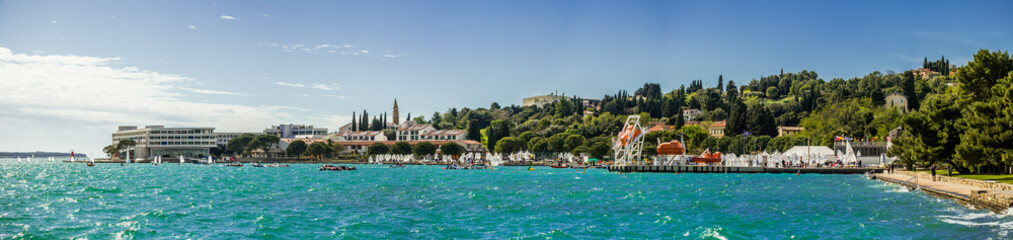 PORTOROZ, SLOVENIA – April 18, 2025: Regatta boats race across windy waves in a thrilling Easter...