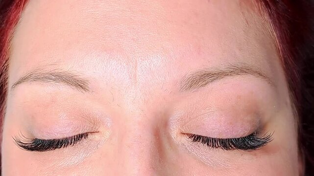 Close up of eye with eyelash extensions ,beauty salon treatment ,2d volume, 3d volume, classical lashes,Russian volume,megavolume, new set.