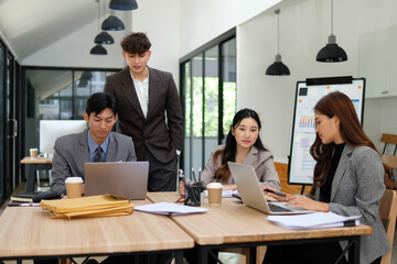 Fototapeta premium Teamwork, planning and brainstorming among employees using technology