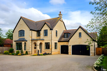 Beautiful exterior of a newly built luxury house in English country.