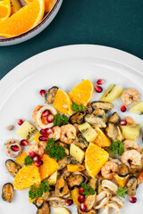 Spicy seafood salad with fruits.